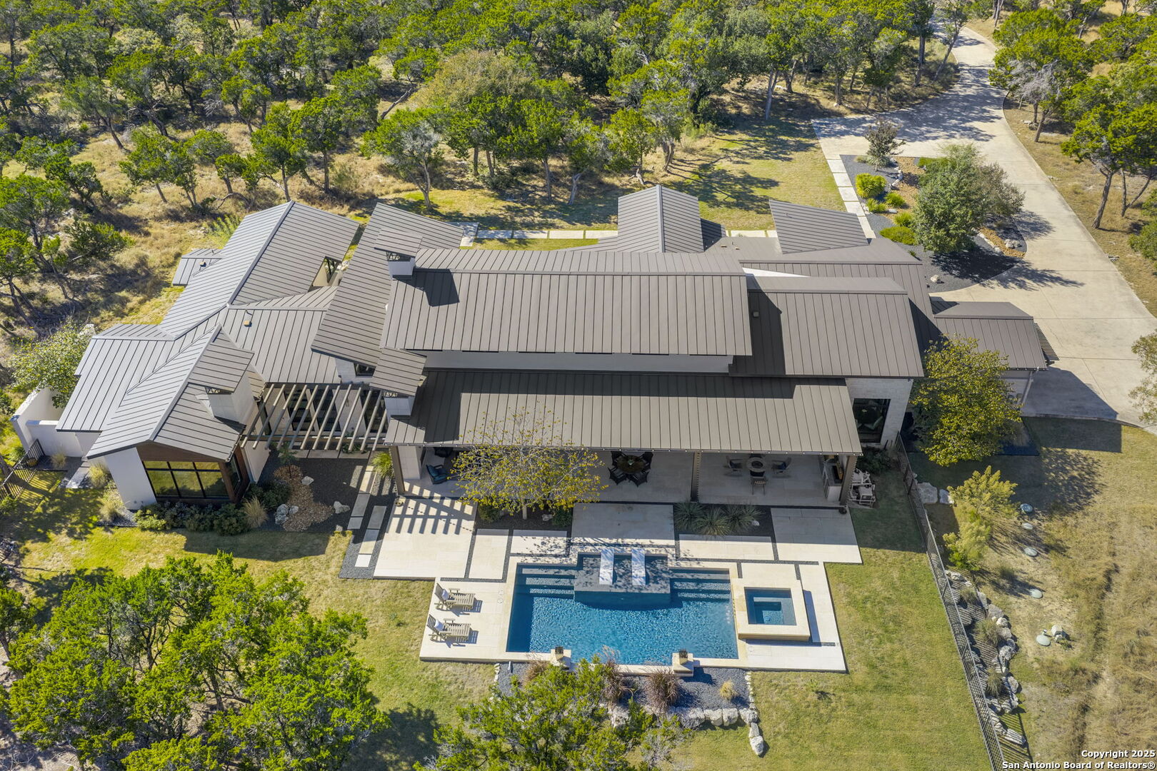 116 Sendero Ridge Boerne, TX 78006 - Photo 58 of 58 an aerial view of a house with swimming pool and outdoor seating