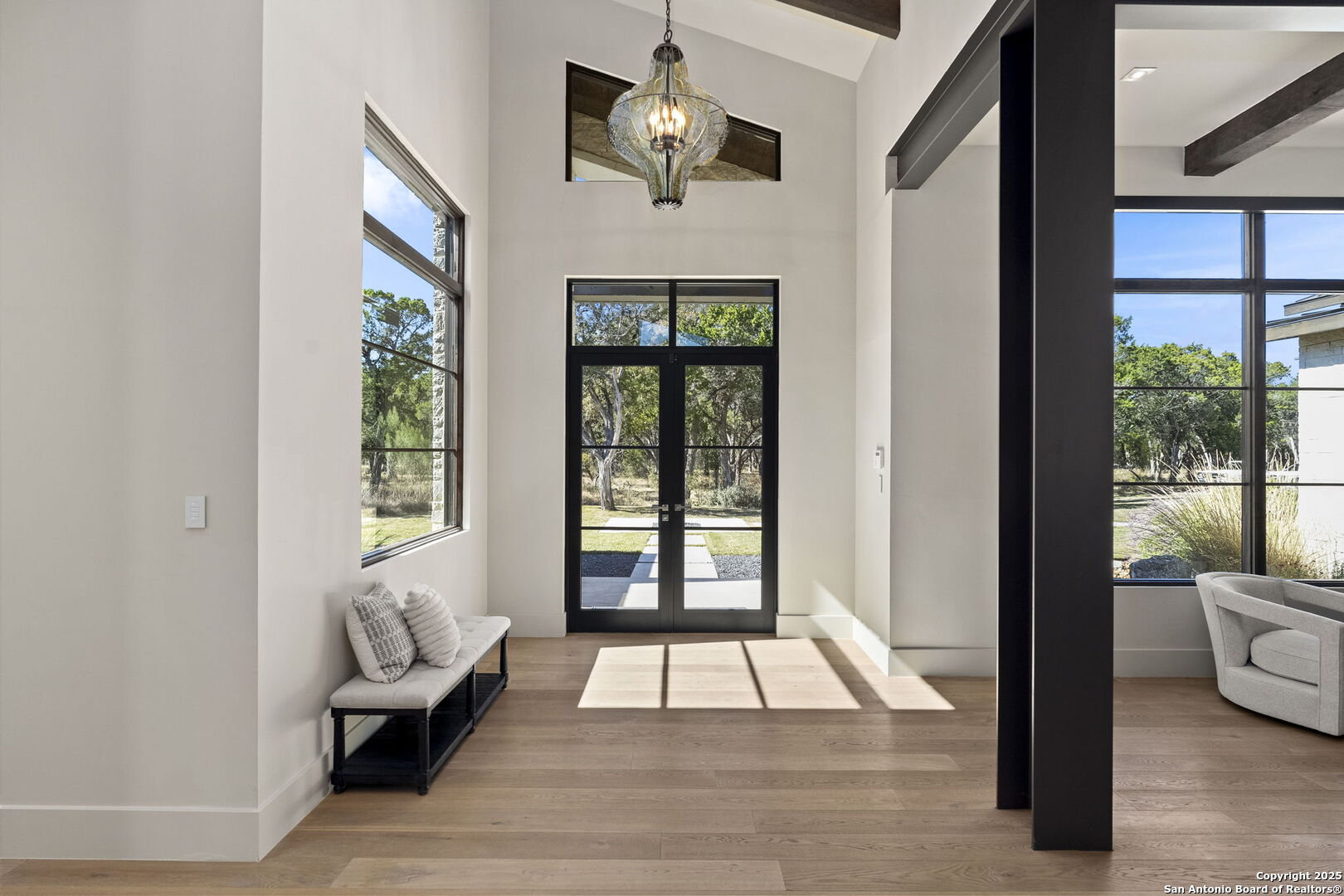 116 Sendero Ridge Boerne, TX 78006 - Photo 9 of 58 a very nice looking room with a large window and chandelier