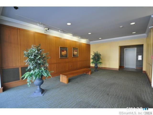 99 Prospect Street, Unit 5M Stamford, CT 06901 - Photo 2 of 10 a view of entryway with wooden floor