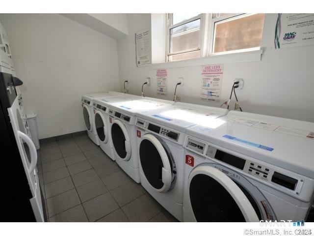 99 Prospect Street, Unit 5M Stamford, CT 06901 - Photo 3 of 10 a utility room with dryer and washer