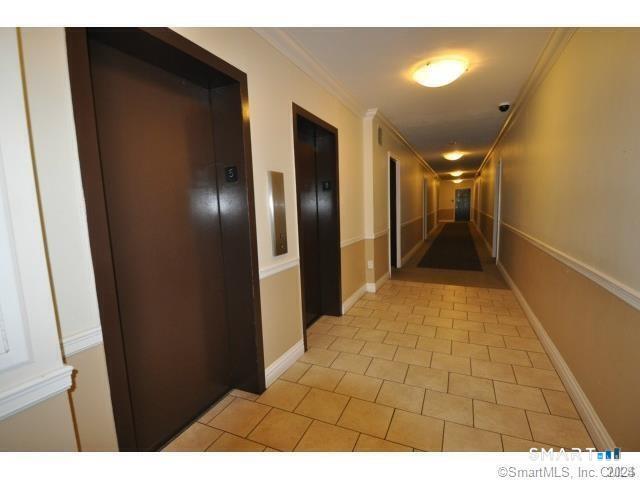 99 Prospect Street, Unit 5M Stamford, CT 06901 - Photo 4 of 10 a view of a hallway