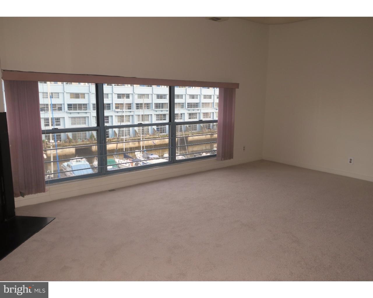 3 North Christopher Columbus Boulevard, Unit 405 Philadelphia, PA 19106 - Photo 1 of 20 a view of an empty room with a window