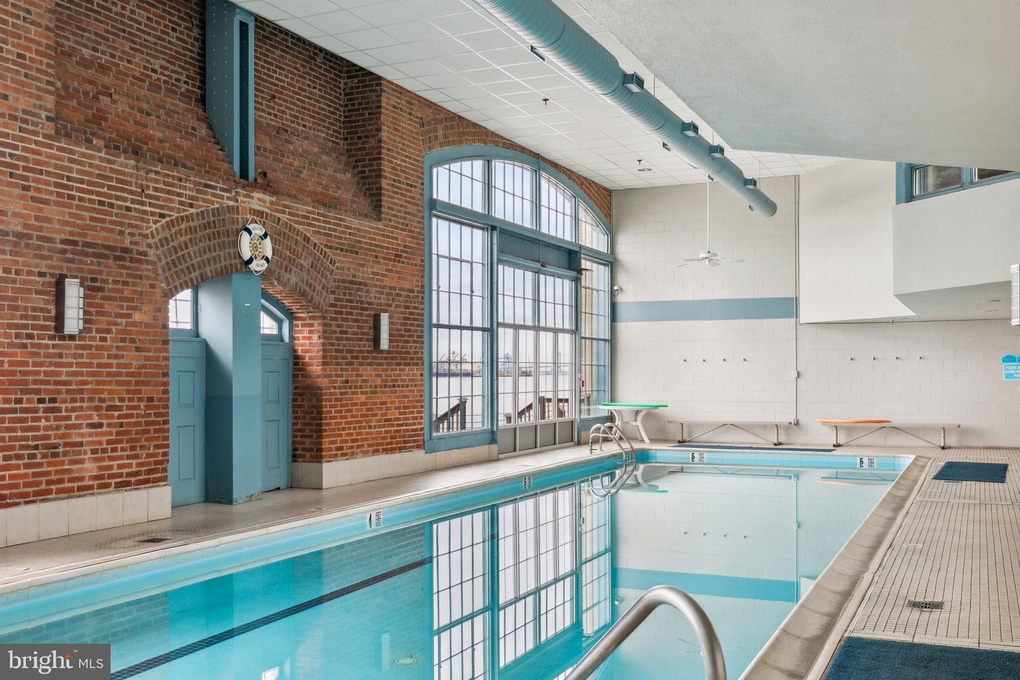 3 North Christopher Columbus Boulevard, Unit 405 Philadelphia, PA 19106 - Photo 15 of 20 a view of a kitchen with a sink and cabinets