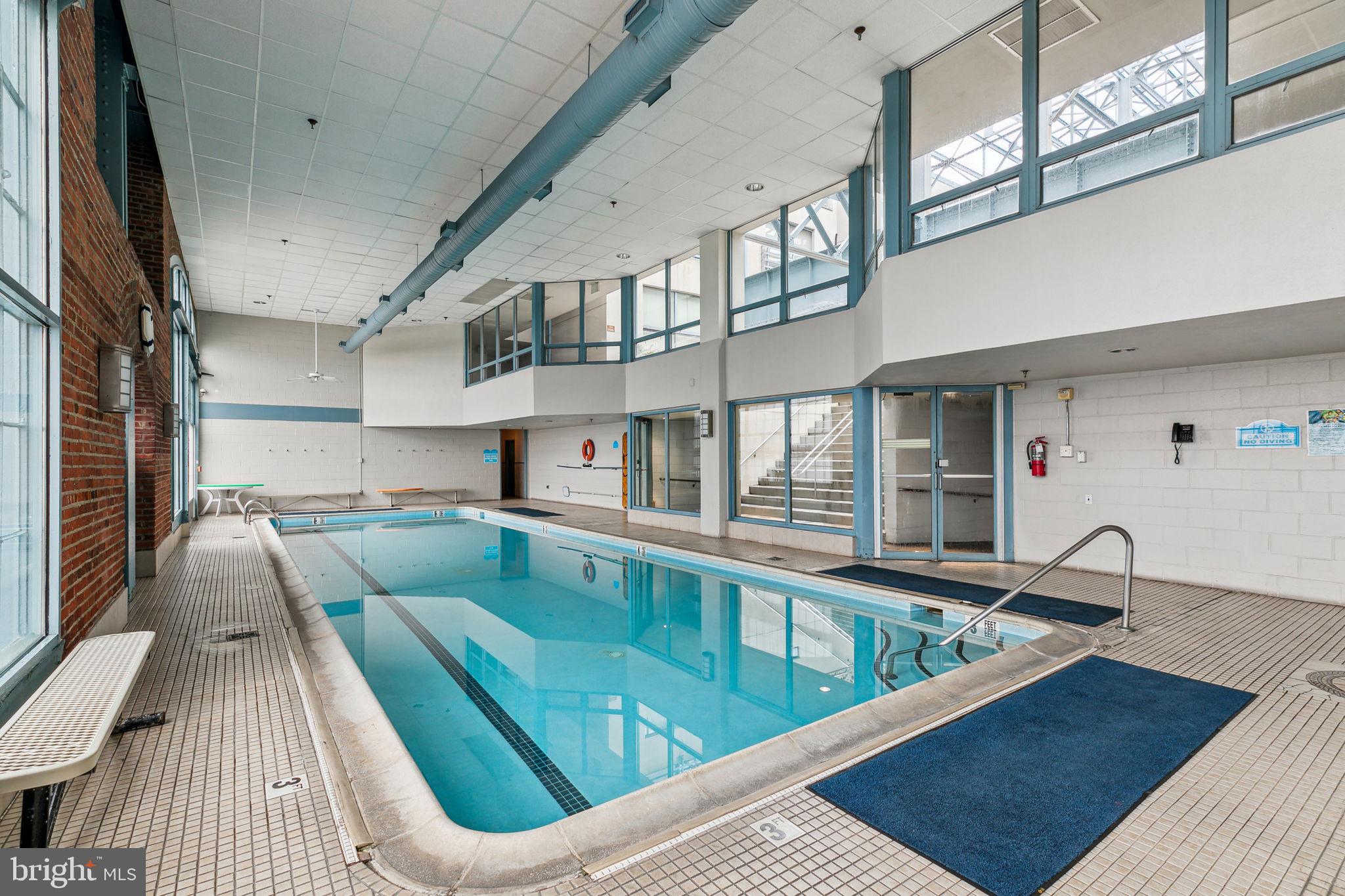 3 North Christopher Columbus Boulevard, Unit 405 Philadelphia, PA 19106 - Photo 16 of 20 a view of a kitchen with furniture and a kitchen