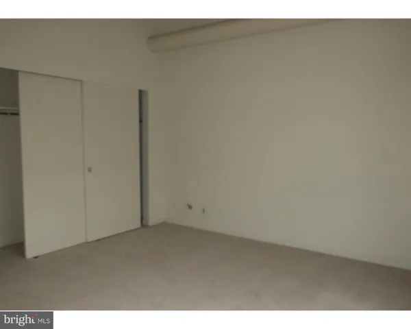 a view of swimming pool with outdoor seating space