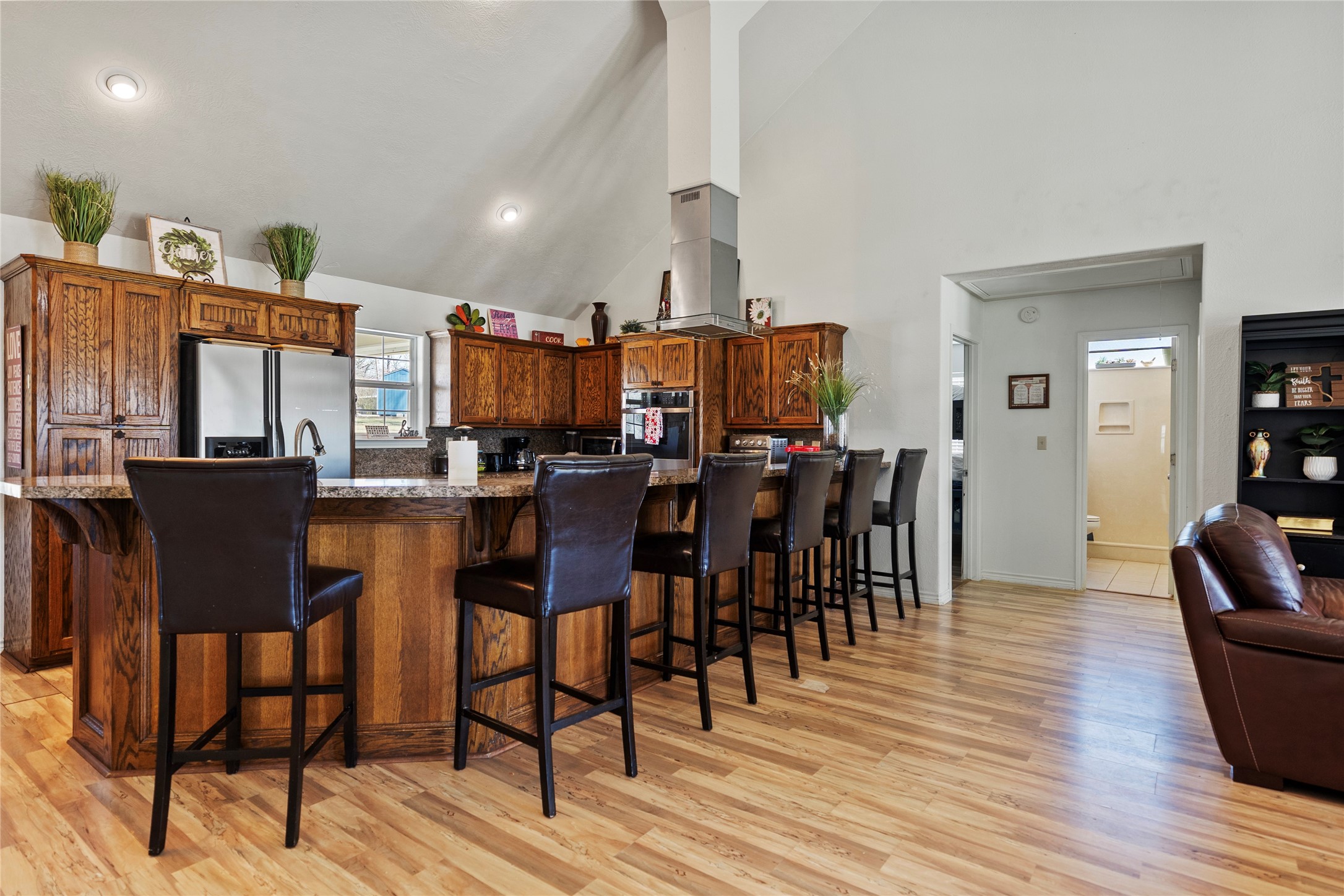 6776 Farm To Market Road 356 Trinity, TX 75862 - Photo 23 of 50 a view of a dining room with furniture and wooden floor