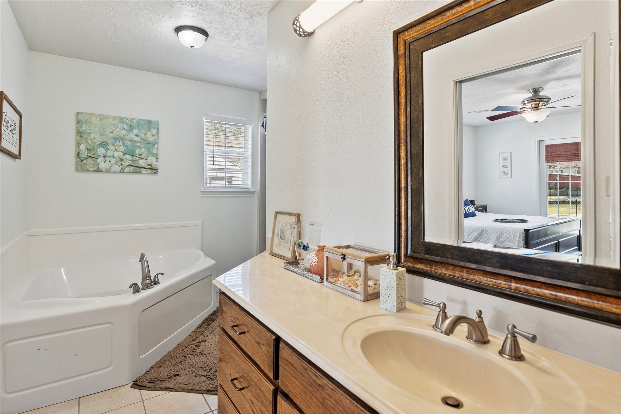 6776 Farm To Market Road 356 Trinity, TX 75862 - Photo 29 of 50 a bathroom with a sink and a mirror