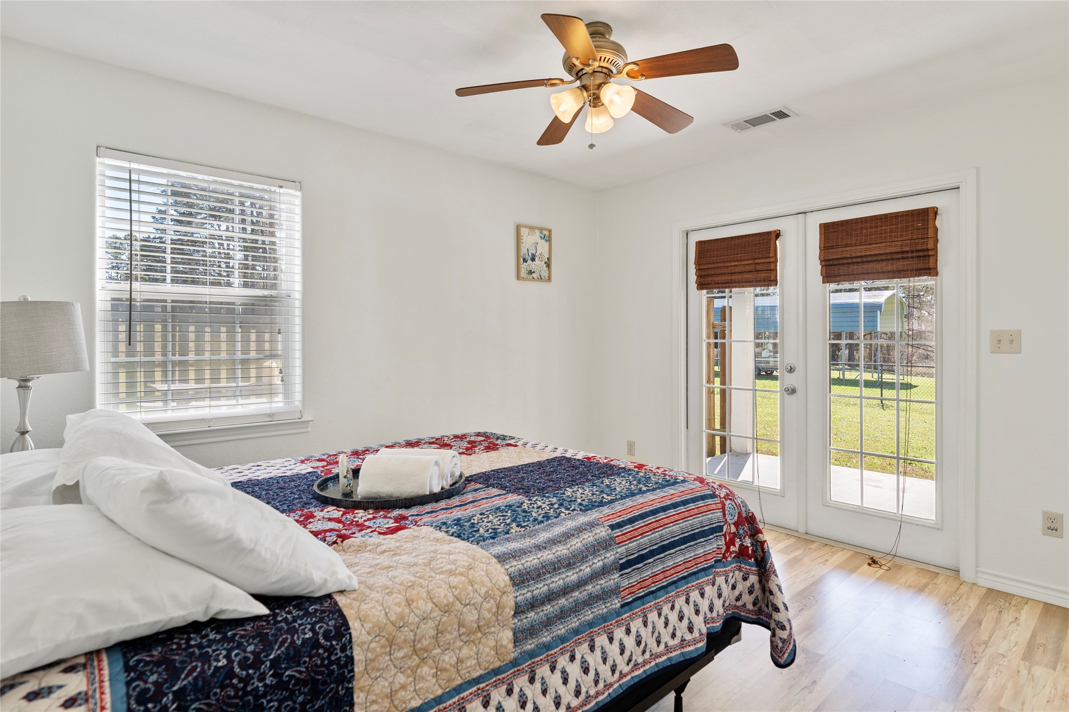 6776 Farm To Market Road 356 Trinity, TX 75862 - Photo 31 of 50 a bedroom with a bed and wooden floor