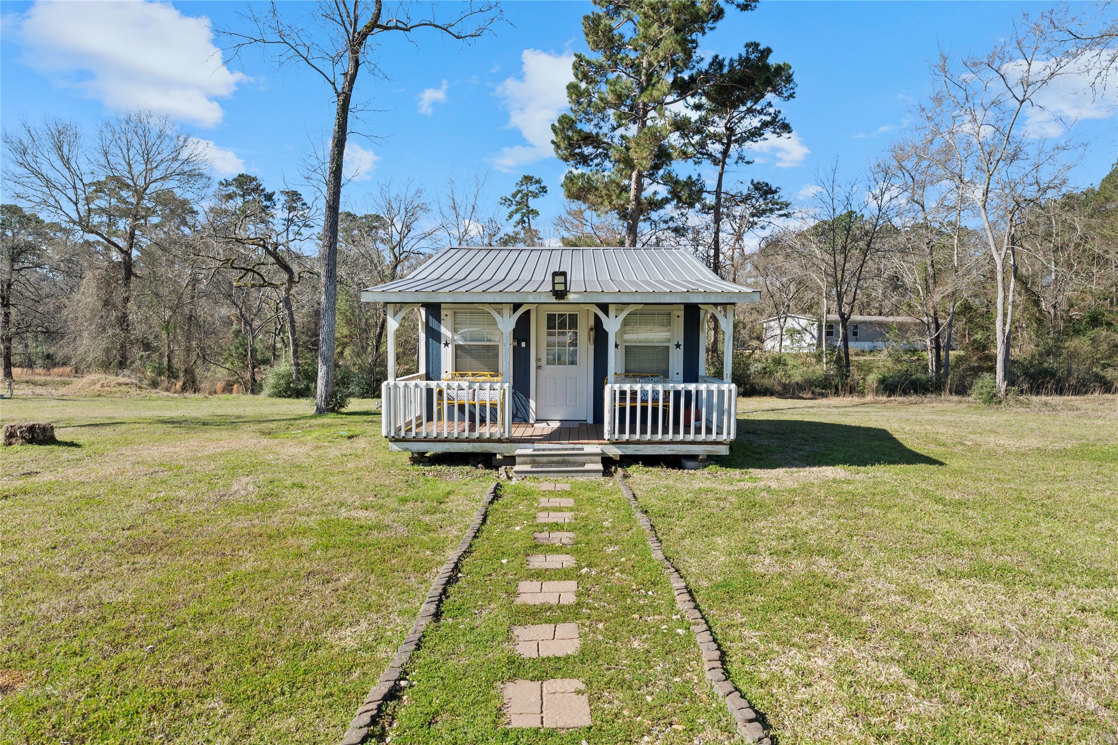 6776 Farm To Market Road 356 Trinity, TX 75862 - Photo 39 of 50 a view of swimming pool with deck and yard