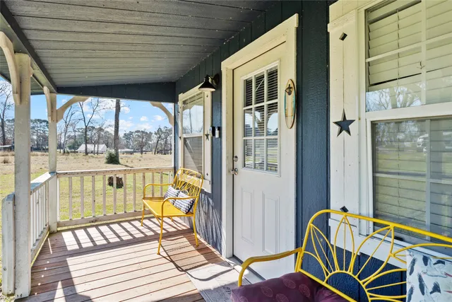 view of a balcony with wooden floor