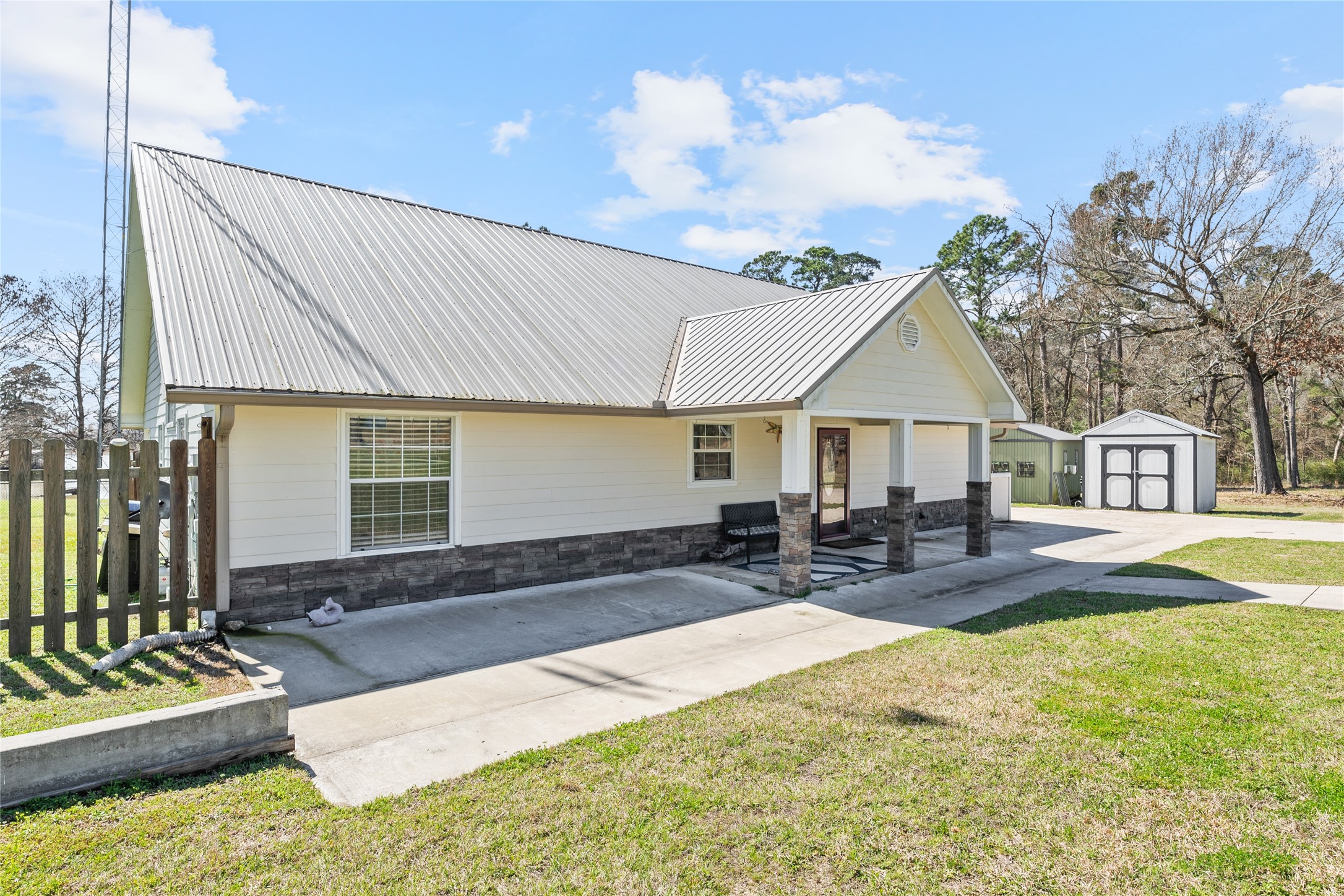 6776 Farm To Market Road 356 Trinity, TX 75862 - Photo 6 of 50 a front view of a house with swimming pool and sitting area