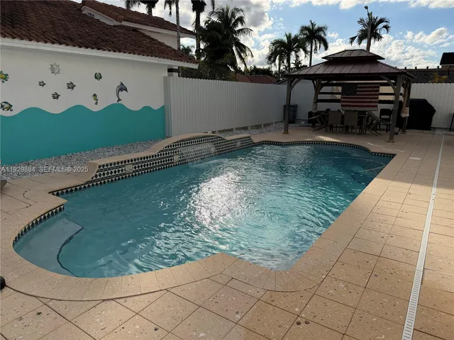 $899,000 | 13966 Southwest 13th Street, Miami, FL 33184