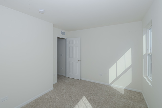 910 Mary, Unit 14 Marengo, IL 60152 - Photo 22 of 27 a view of an empty room