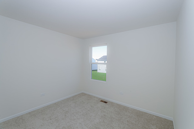 910 Mary, Unit 14 Marengo, IL 60152 - Photo 24 of 27 a room that has a window in it