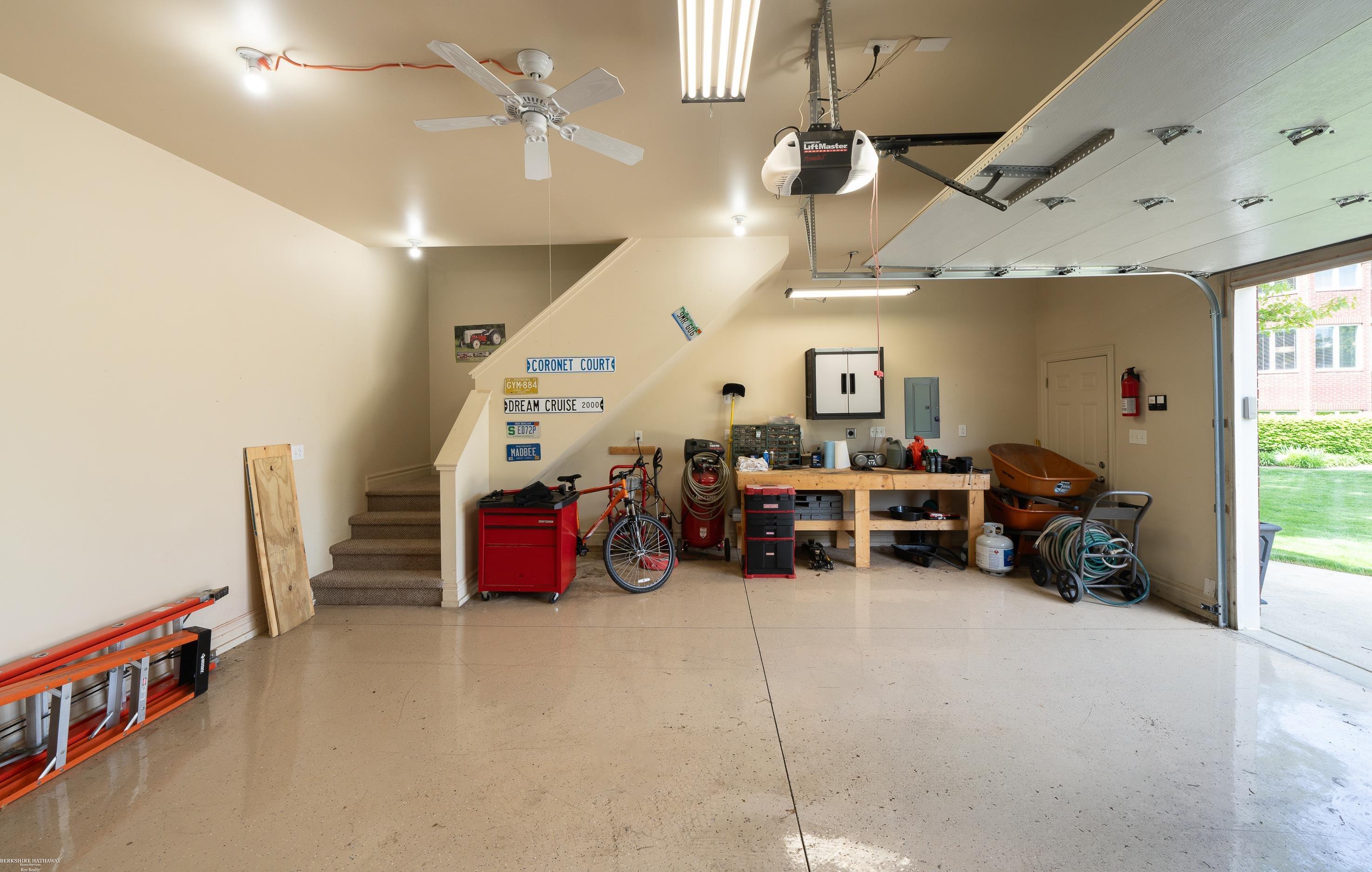 4372 Timber Ridge Drive Romeo, MI 48065 - Photo 68 of 84 Staircase from Garage to Basement * Epoxy Floor 3+ Cars and Upper storage/Room
