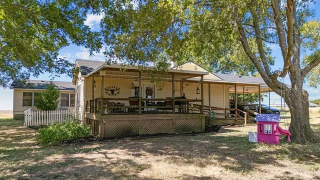 a front view of a house with a porch