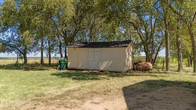 a view of a garden with a pathway