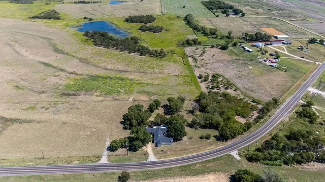 a view of a garden with wooden floor