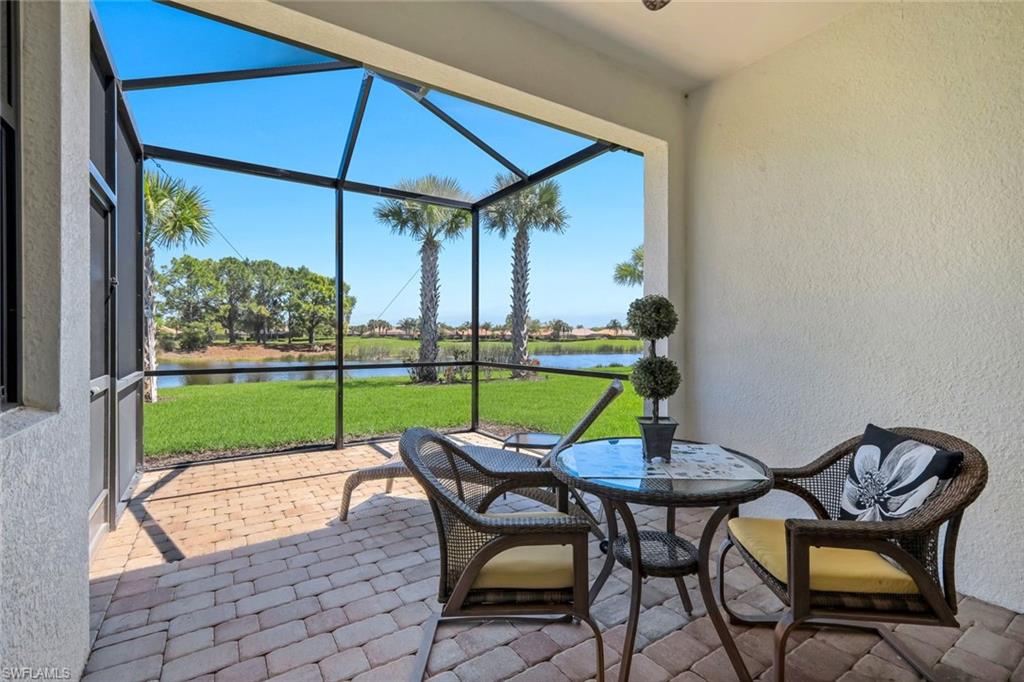 5948 Mayflower Way Ave Maria, FL 34142 - Photo 27 of 48 a view of chairs and table in the yard