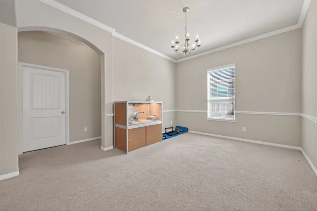 a room with a bed and window