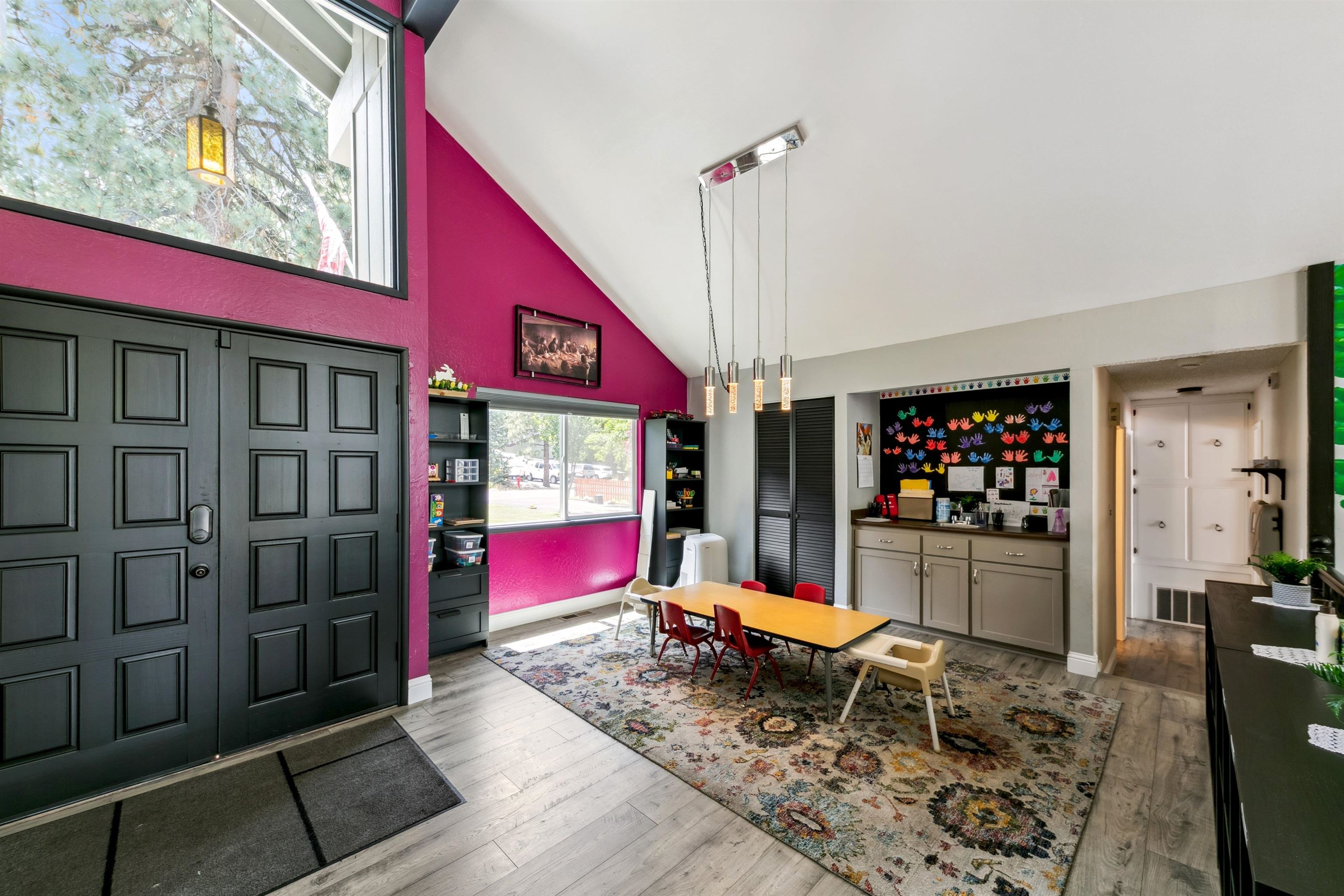 10228 Jeffery Pine Road Truckee, CA 96161 - Photo 13 of 28 a living room with furniture a flat screen tv and a dining table