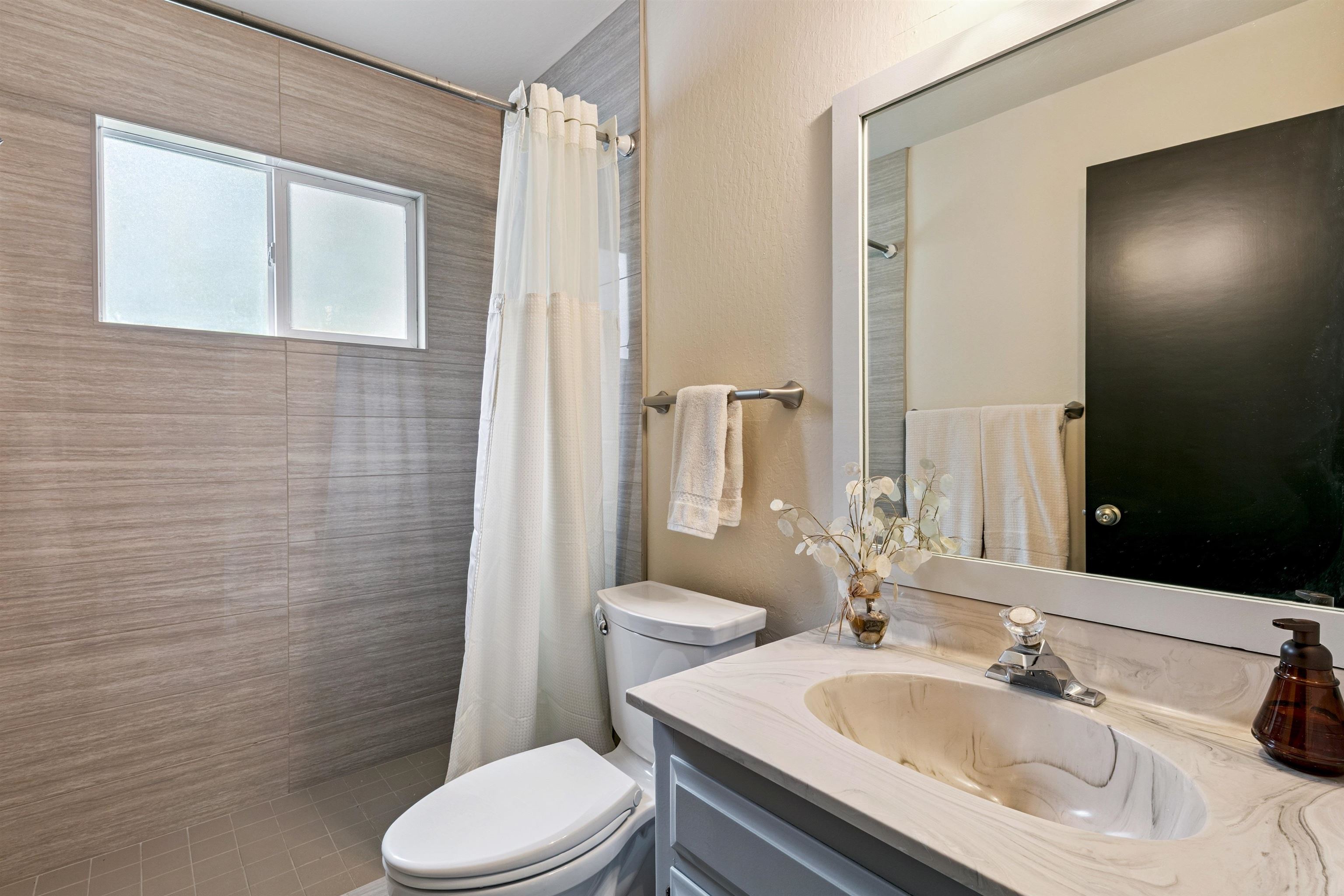 10228 Jeffery Pine Road Truckee, CA 96161 - Photo 16 of 28 a bathroom with a sink and a mirror