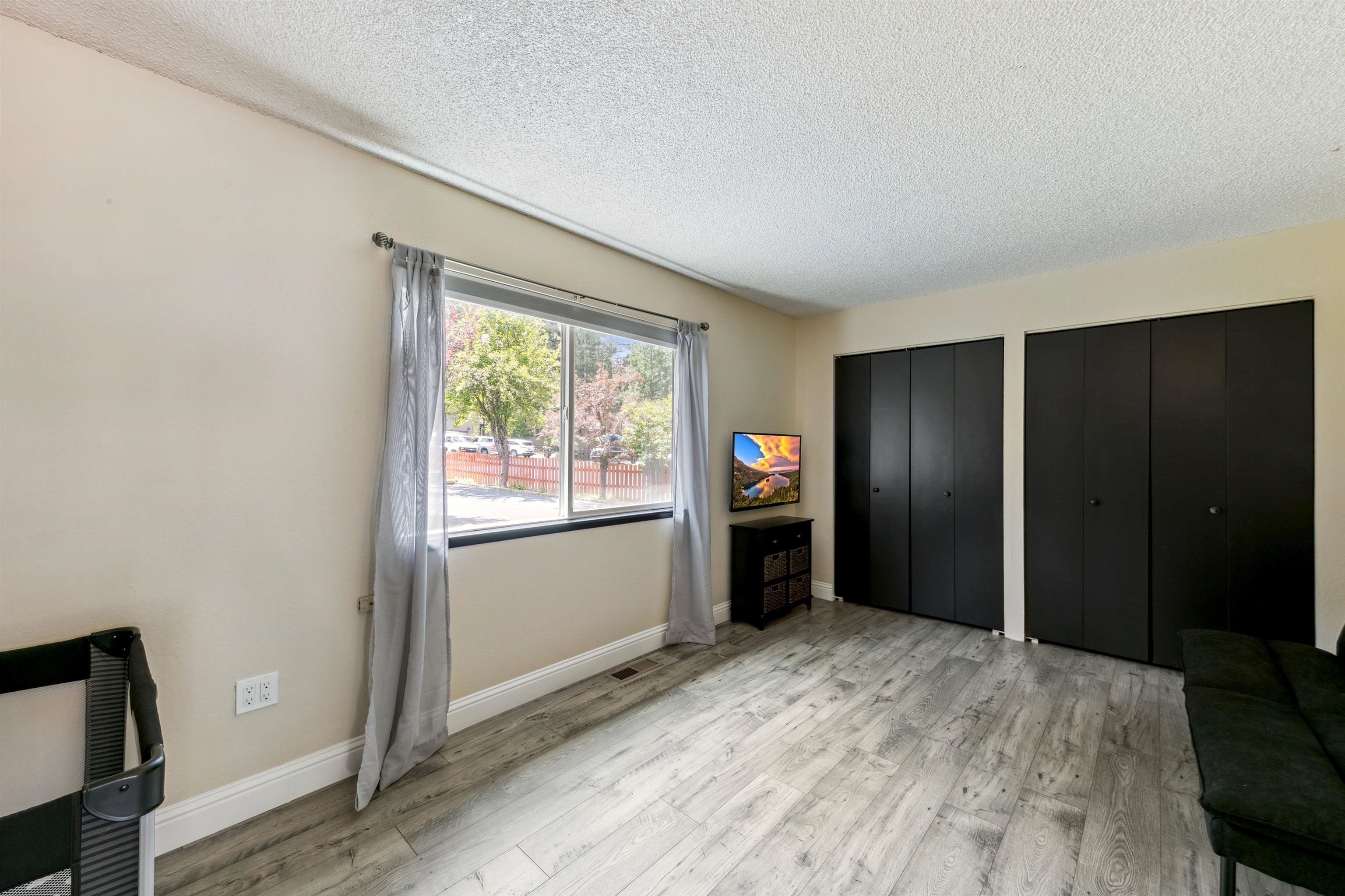 10228 Jeffery Pine Road Truckee, CA 96161 - Photo 19 of 28 a view of an empty room with a window