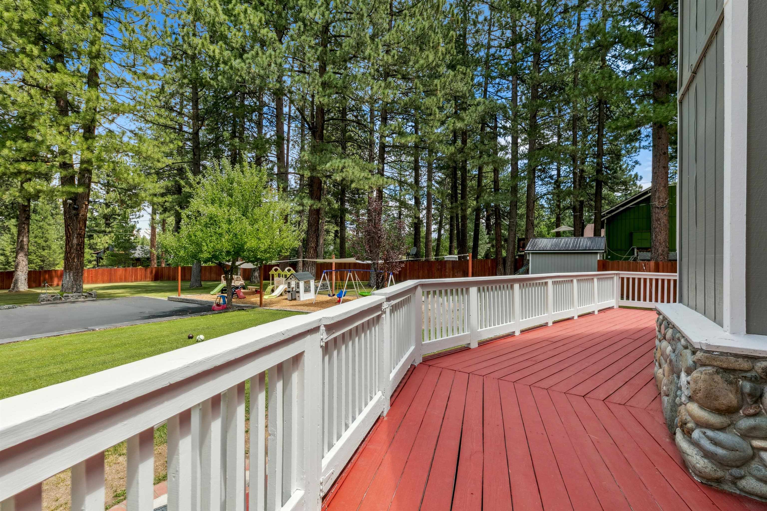 10228 Jeffery Pine Road Truckee, CA 96161 - Photo 24 of 28 a view of balcony with deck and trees