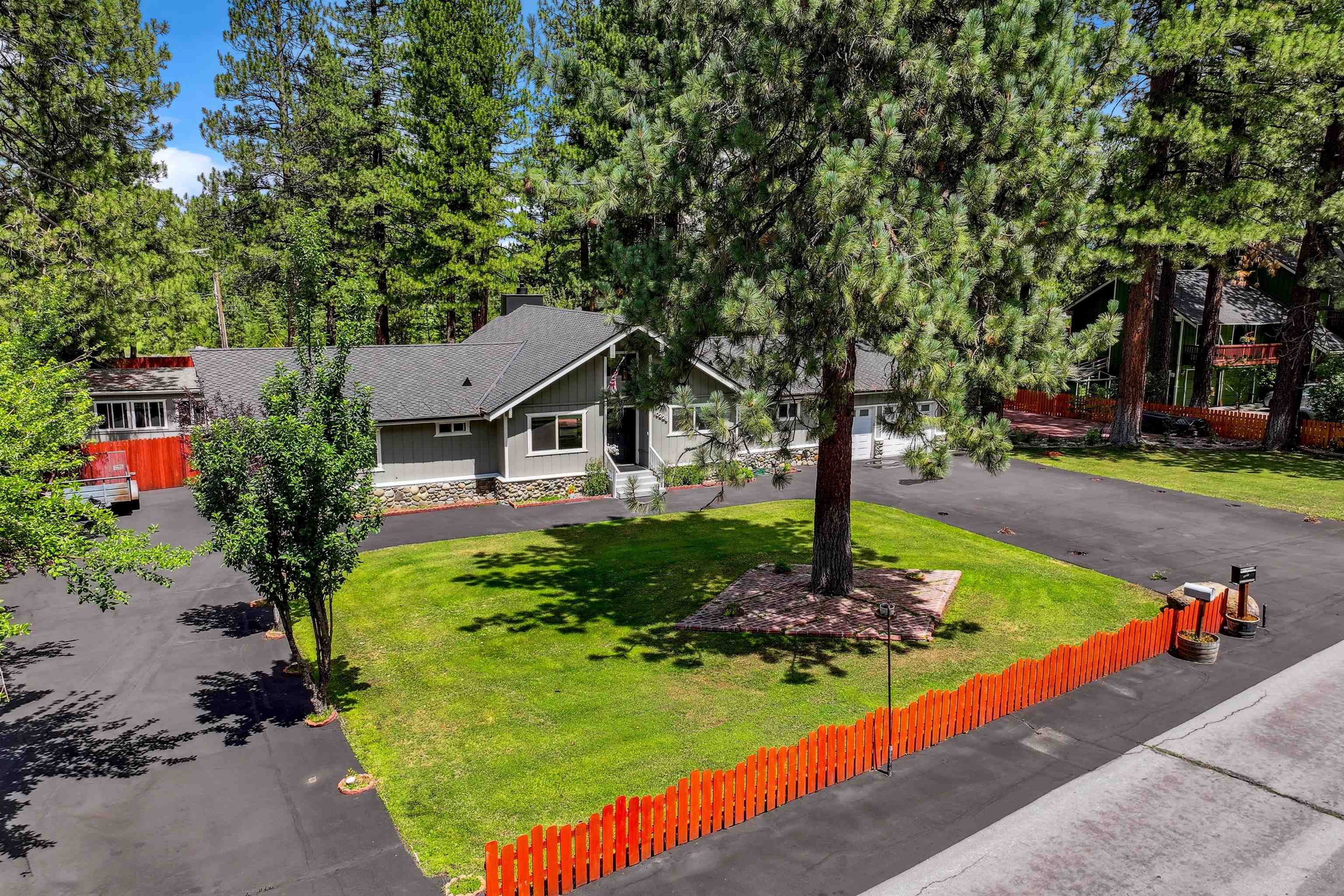 10228 Jeffery Pine Road Truckee, CA 96161 - Photo 8 of 28 a front view of a house with a yard