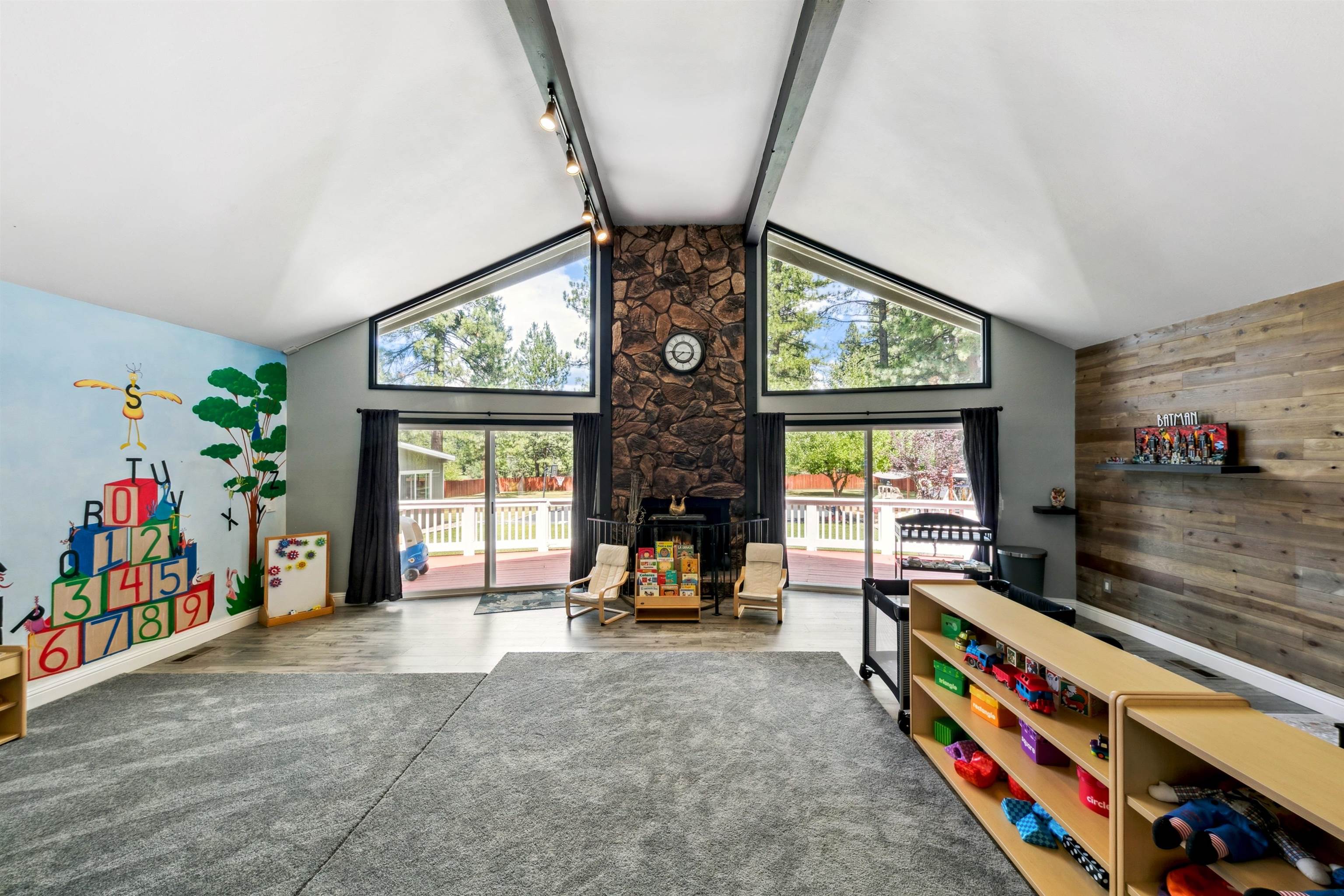 10228 Jeffery Pine Road Truckee, CA 96161 - Photo 10 of 28 a very nice looking room with a large window and a chandelier