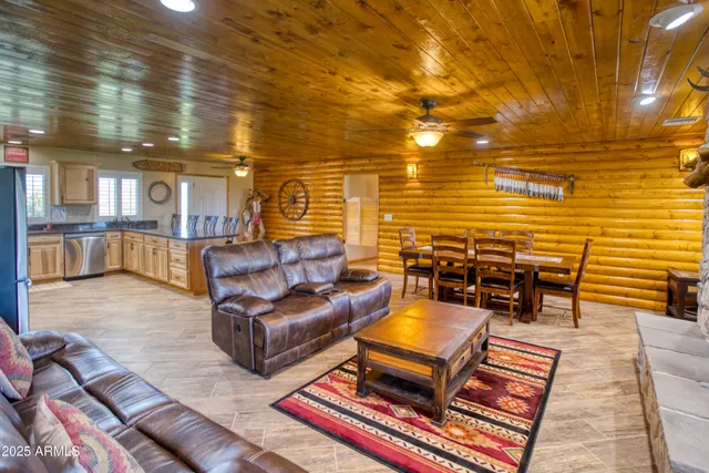 a house view with a sitting space and garden