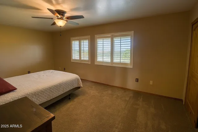 a view of city and ocean from a balcony