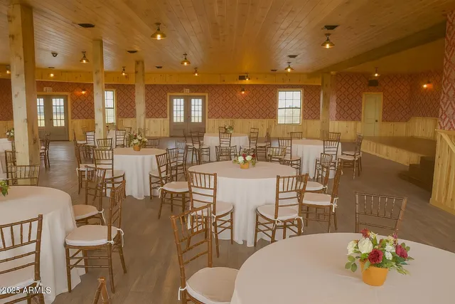 a view of a house with a snow in the yard