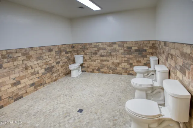 a view of a balcony with wooden floor