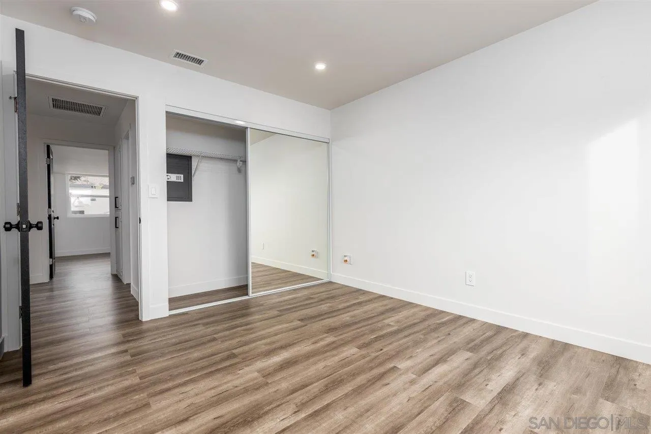 9469 Terrywood Road Santee, CA 92071 - Photo 13 of 25 wooden floor in a hall with an empty room
