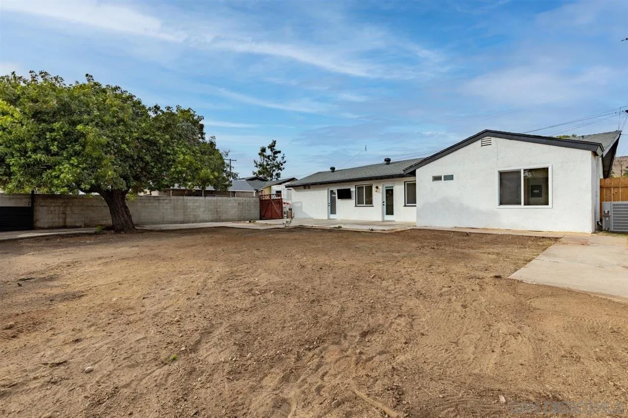 9469 Terrywood Road Santee, CA 92071 - Photo 22 of 25 a house view with a garden