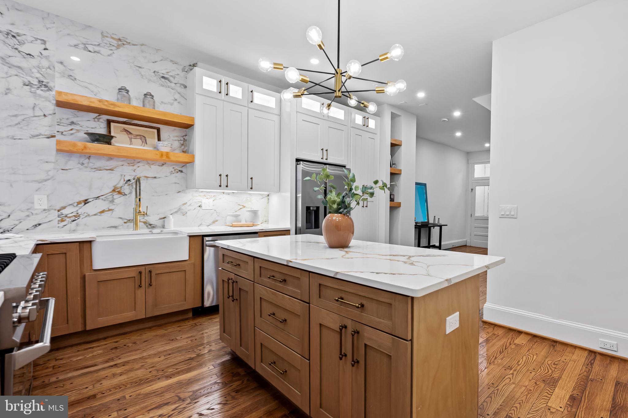 2641 North Calvert Street Baltimore, MD 21218 - Photo 11 of 47 kitchen-island-and-custom-cabinets-renovated-home-