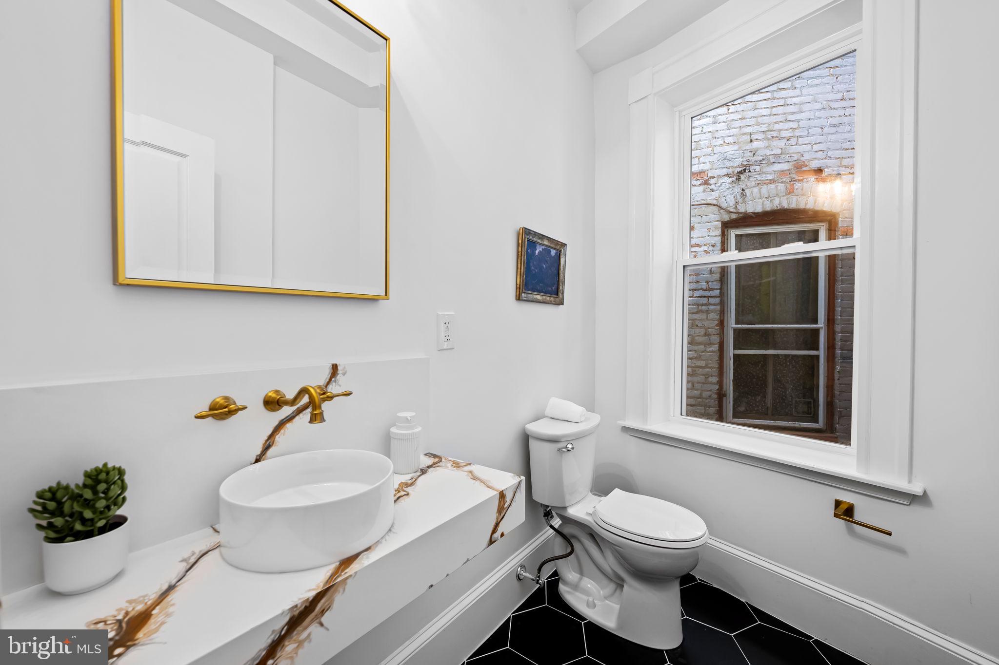 2641 North Calvert Street Baltimore, MD 21218 - Photo 13 of 47 powder-room-main-floor-modern-fixtures-baltimore-h