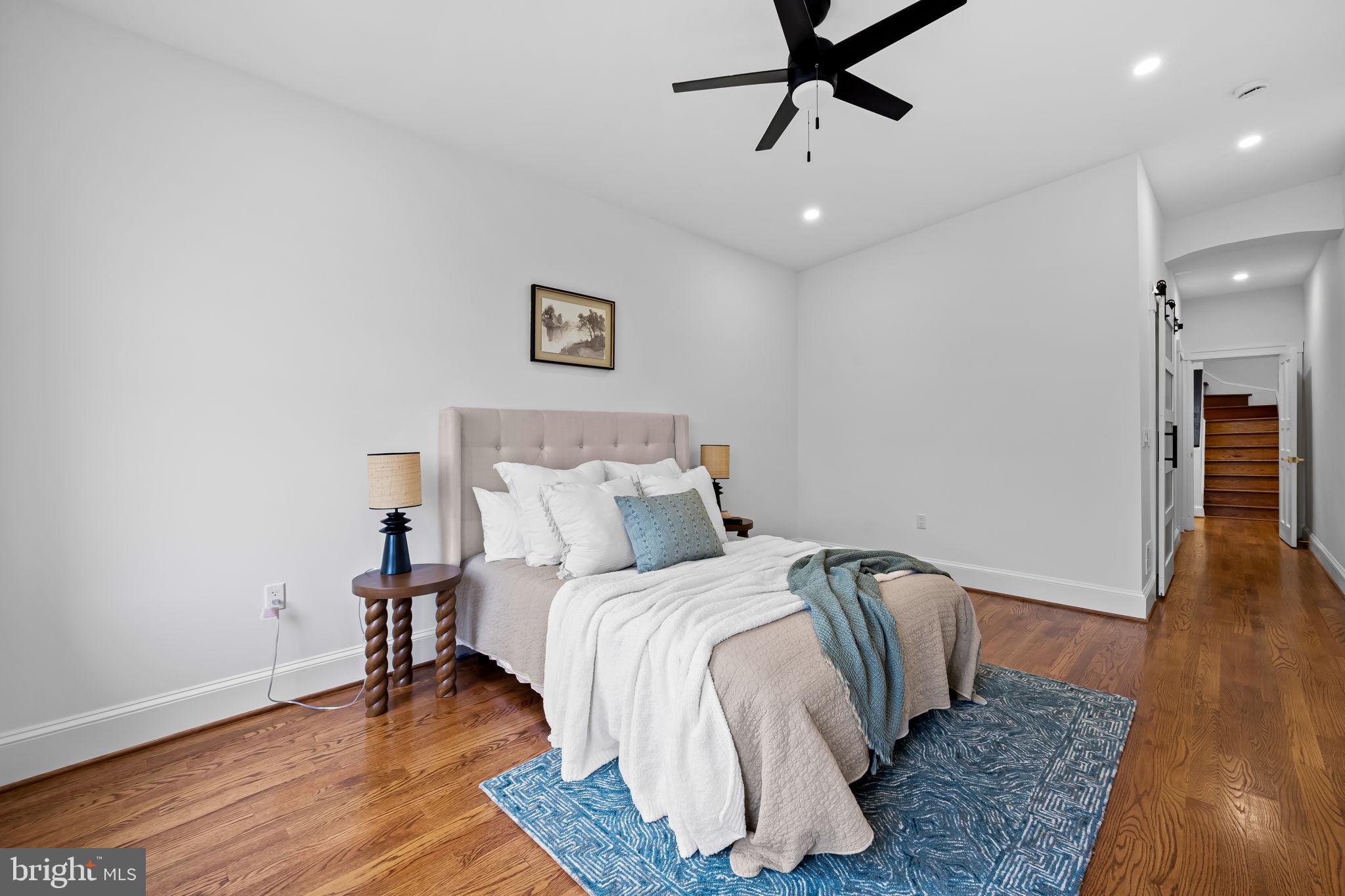 2641 North Calvert Street Baltimore, MD 21218 - Photo 19 of 47 primary-suite-spa-bathroom-walk-in-closet-charles-