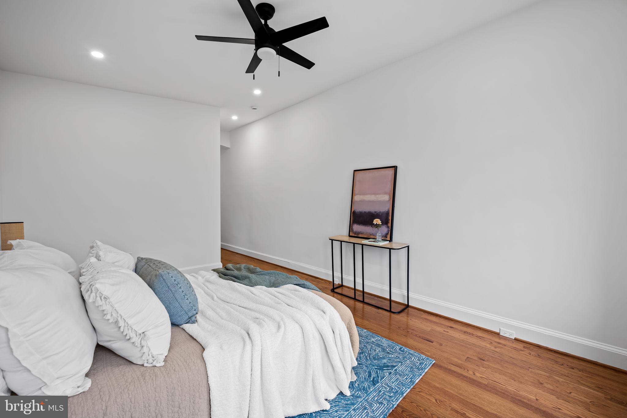 2641 North Calvert Street Baltimore, MD 21218 - Photo 20 of 47 primary-suite-spa-bathroom-walk-in-closet-charles-