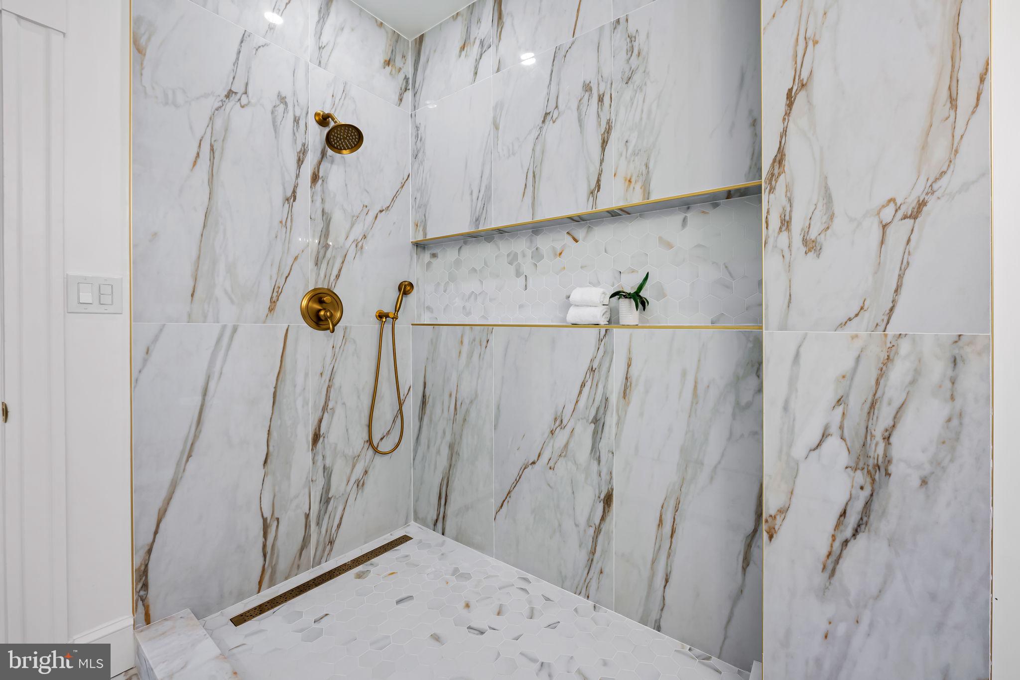 2641 North Calvert Street Baltimore, MD 21218 - Photo 23 of 47 primary-suite-spa-bathroom-walk-in-closet-charles-