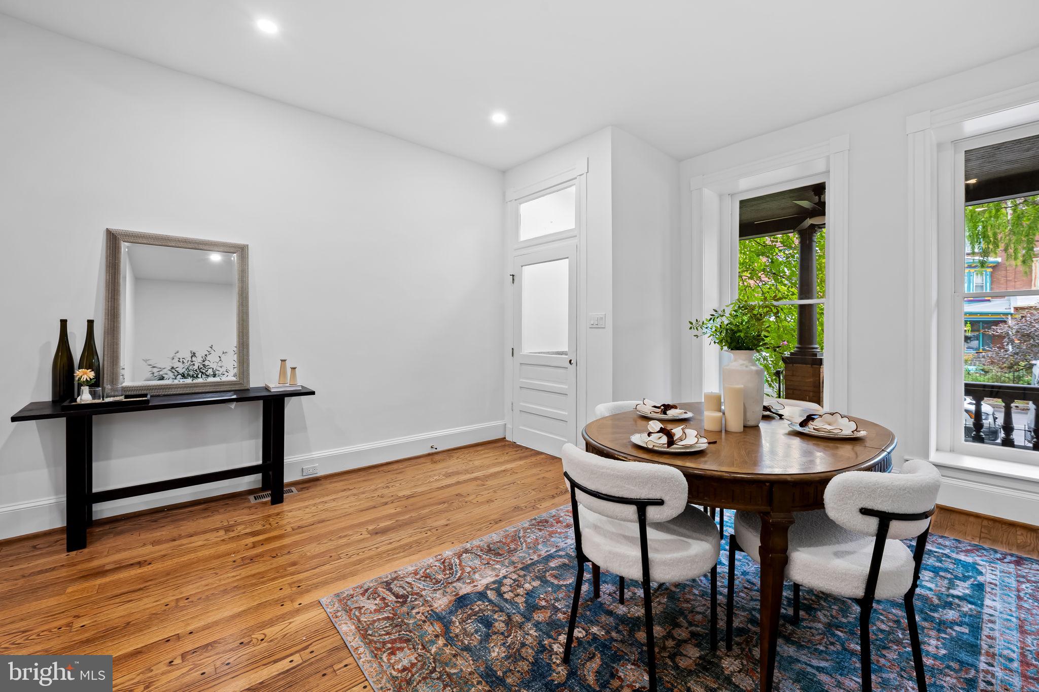 2641 North Calvert Street Baltimore, MD 21218 - Photo 5 of 47 sun-filled-dining-room-hardwood-floors-charles-vil