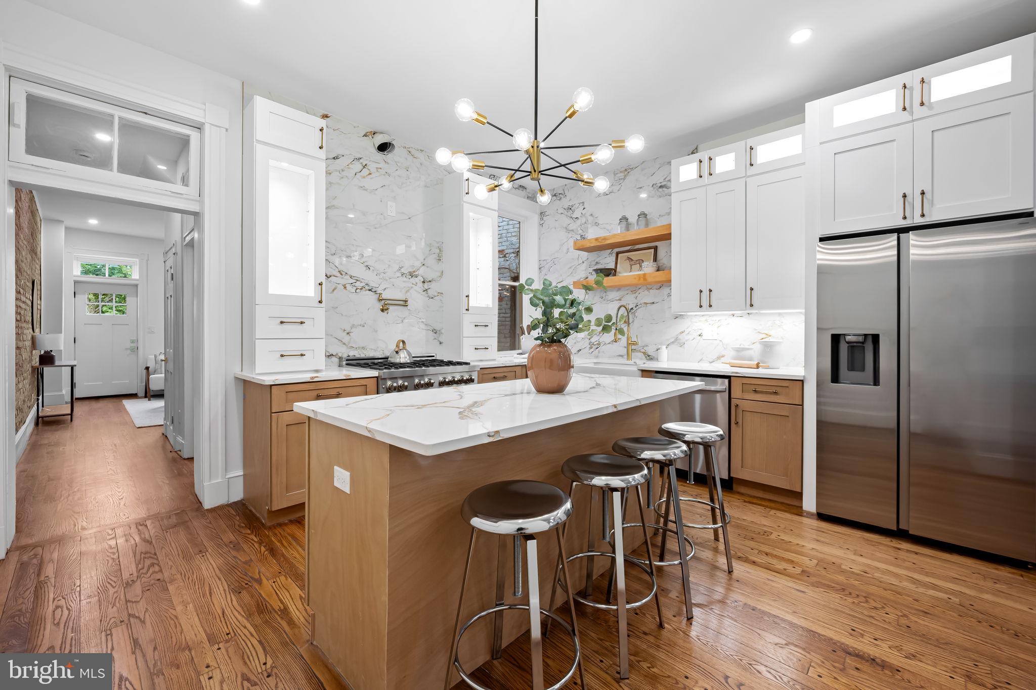 2641 North Calvert Street Baltimore, MD 21218 - Photo 8 of 47 kitchen-island-and-custom-cabinets-renovated-home-