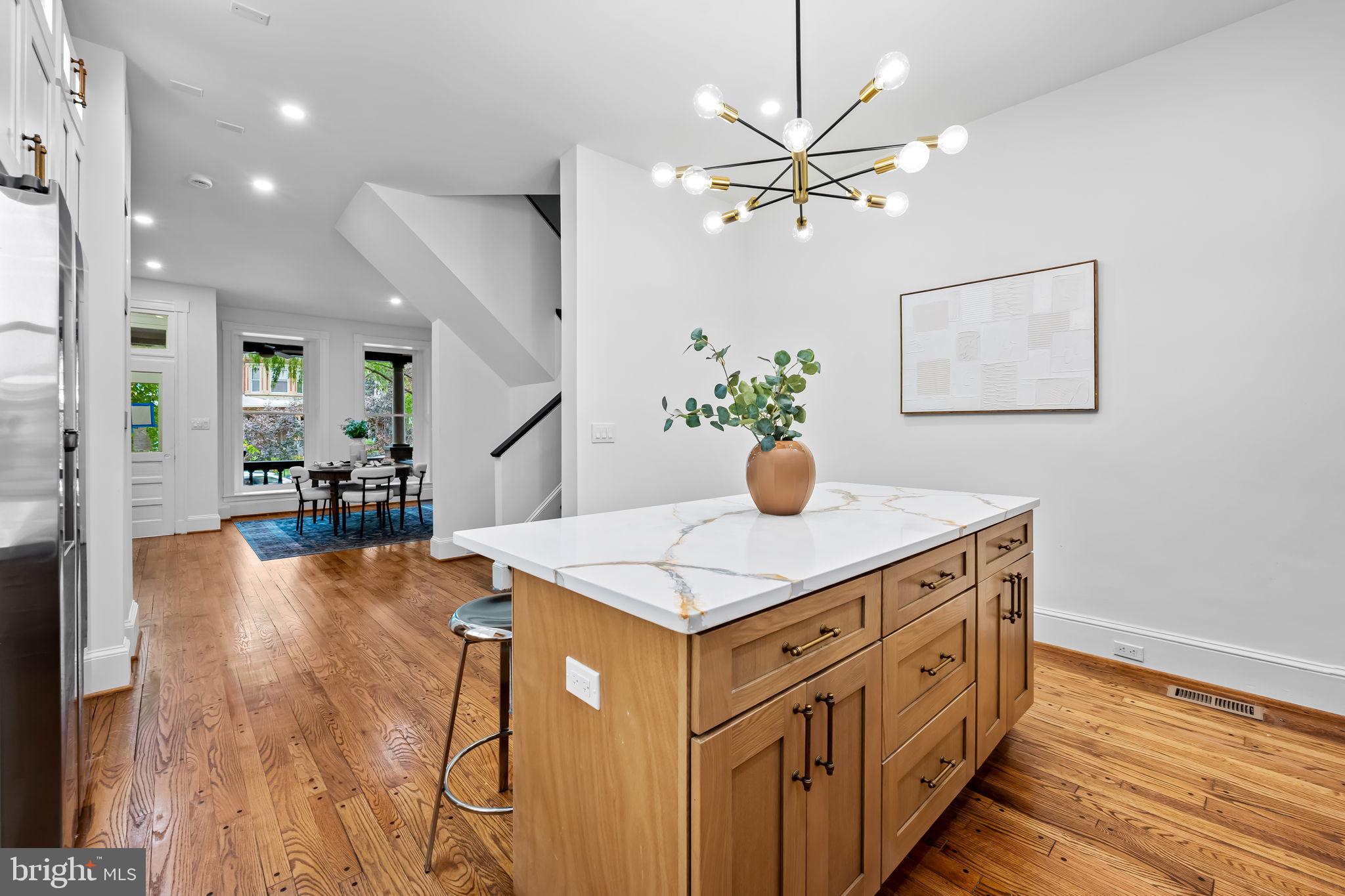 2641 North Calvert Street Baltimore, MD 21218 - Photo 10 of 47 kitchen-island-and-custom-cabinets-renovated-home-