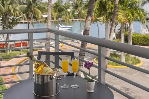 a view of swimming pool with seating area