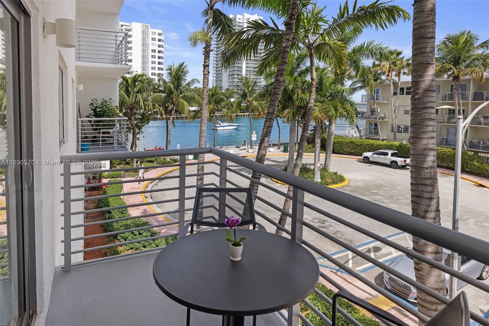 1450 Lincoln Road, Unit 304 Miami Beach, FL 33139 - Photo 30 of 35 a view of balcony with a potted plant