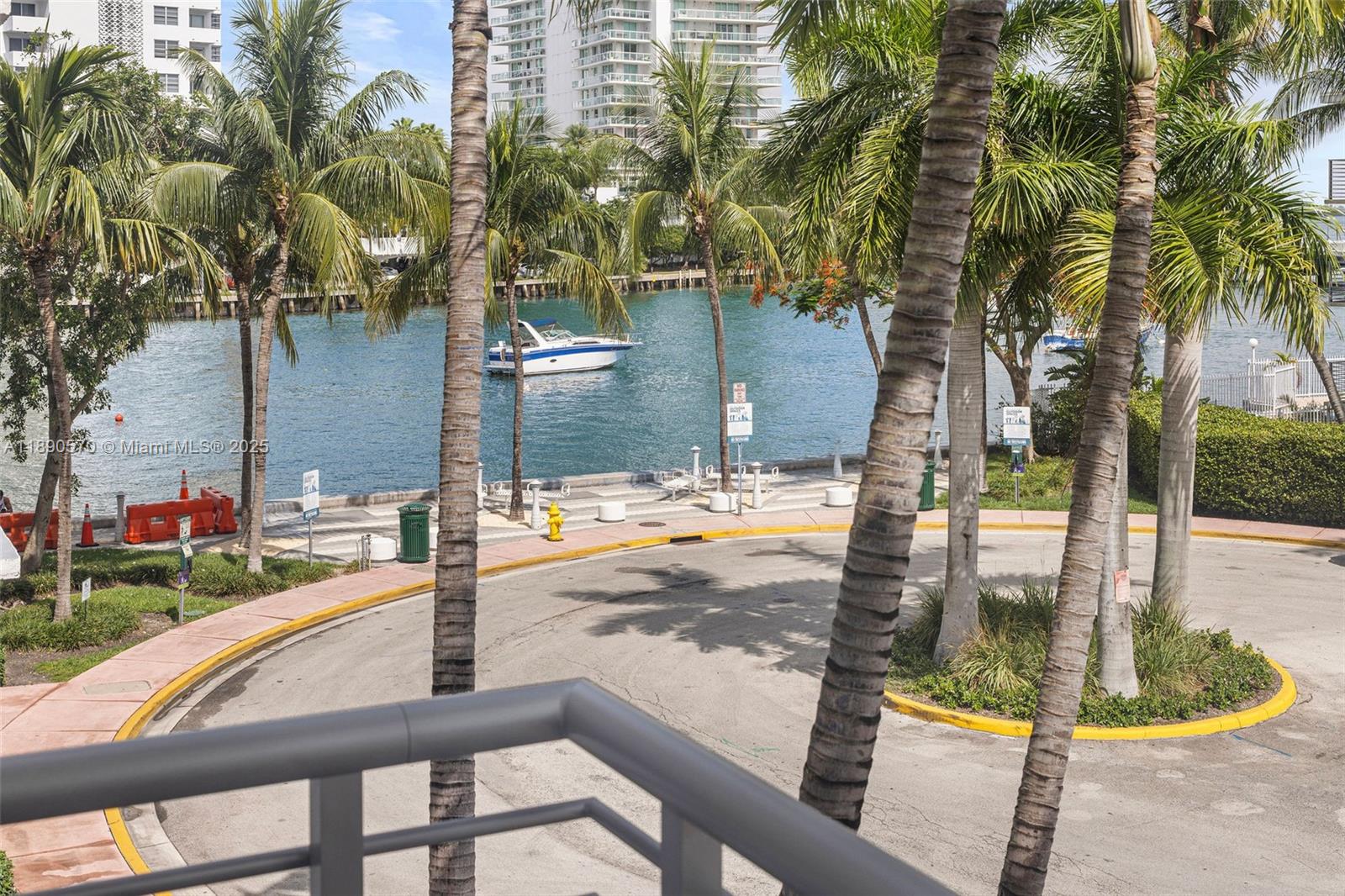 1450 Lincoln Road, Unit 304 Miami Beach, FL 33139 - Photo 3 of 35 a view of a swimming pool with a patio