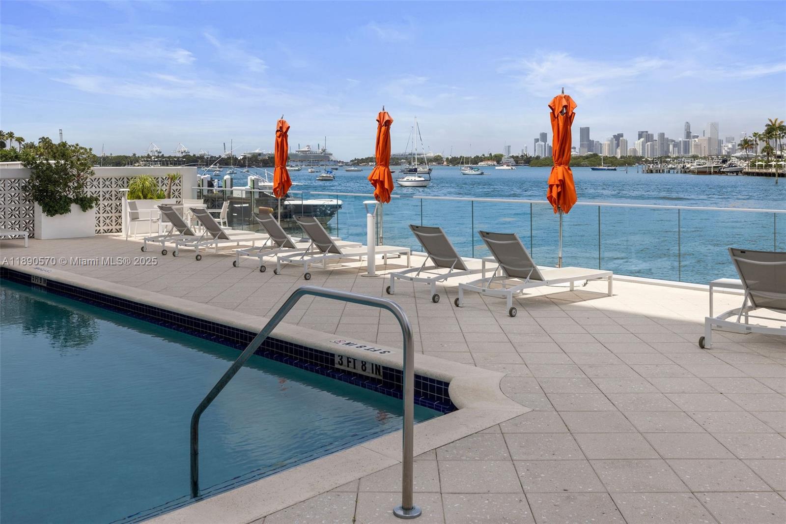 1450 Lincoln Road, Unit 304 Miami Beach, FL 33139 - Photo 34 of 35 a view of a terrace with chairs