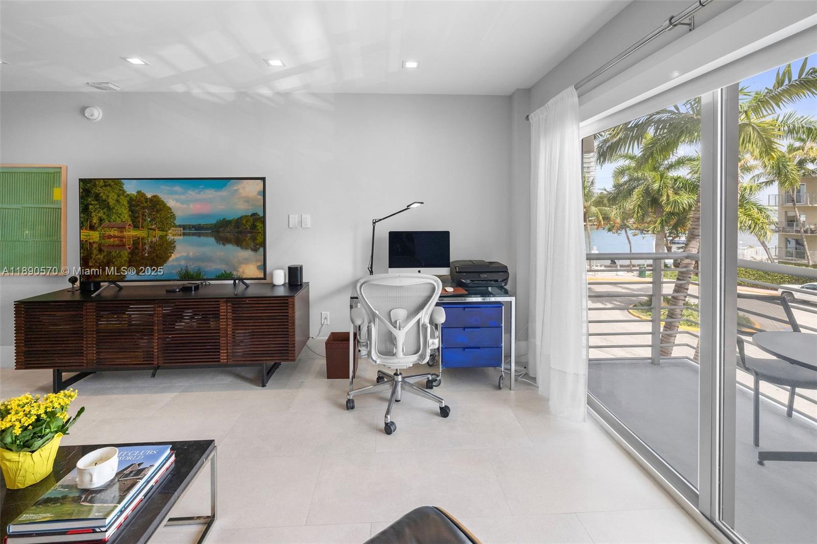 1450 Lincoln Road, Unit 304 Miami Beach, FL 33139 - Photo 6 of 35 a view of a workspace with furniture