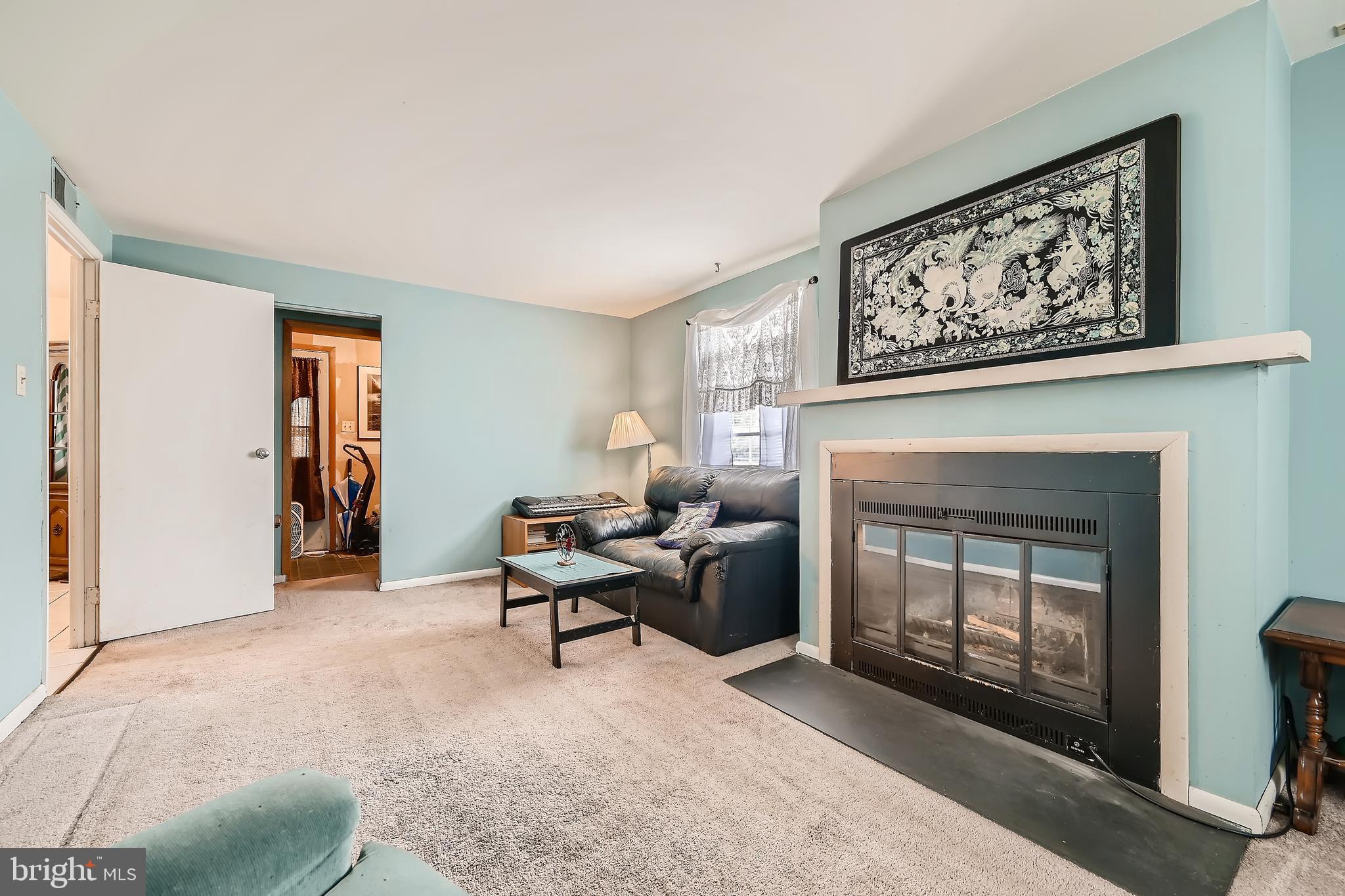 2413 Lodge Farm Road Baltimore, MD 21219 - Photo 5 of 28 Family Room w/ wood burning fireplace